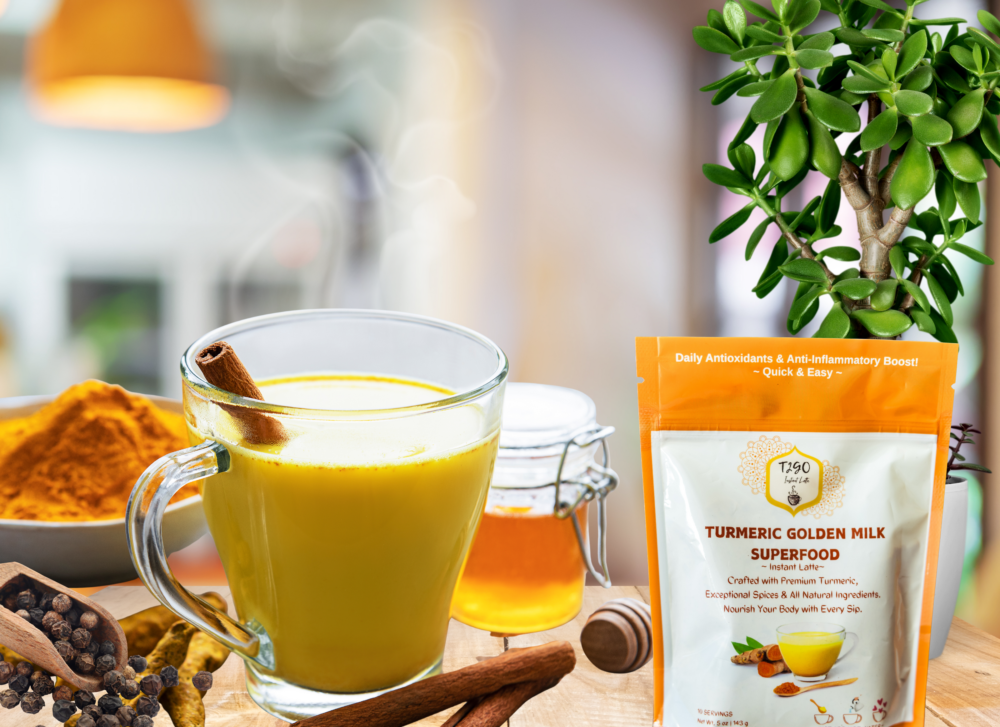 Turmeric Golden Milk with a package of TSG Turmeric Golden Milk Superfood on a wooden table.