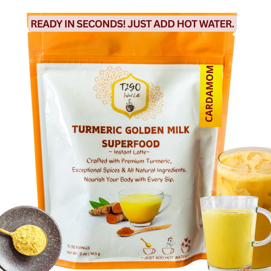 T2GO Turmeric Cardamom Golden Milk instant latte powder in orange 5oz pouch with a frothy golden turmeric latte in a glass, surrounded by cardamom, cinnamon, and fresh turmeric — sugar-free, caffeine-free, just add hot water